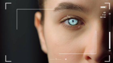 Closeup biometrical vision scanning system inspecting woman eye identifying