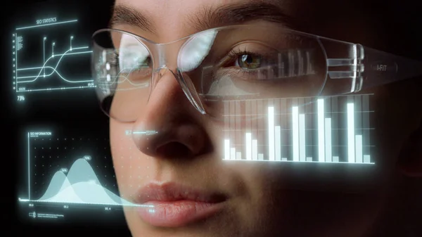 Technological glasses displaying graphs with important economical statistics — Foto de Stock