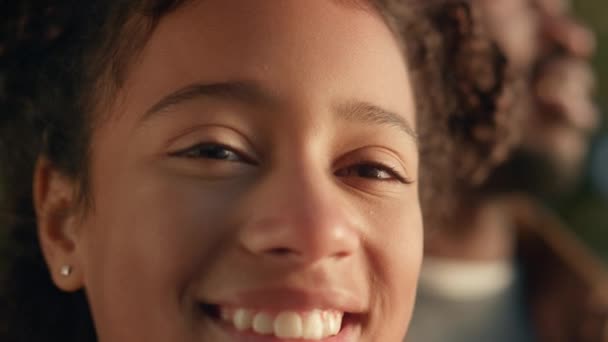 Closeup smiling girl looking camera sparkling eyes. Relaxing cheerful child. — Stock Video