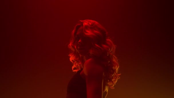 Blonde performing dance show in stripclub closeup. Hot girl dancer raising hands Stock Video Footage by ©stockbusters 