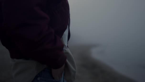 Unrecognizable man dancing ocean beach. Active guy moving hands closeup — Stock Video