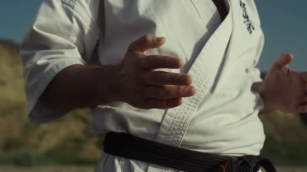 Black Belt Fighter Training Hands Exercises Practicing Karate Front Sandy — Wideo stockowe