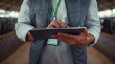 Agribusiness owner touch tablet screen hands closeup. Modern farming technology