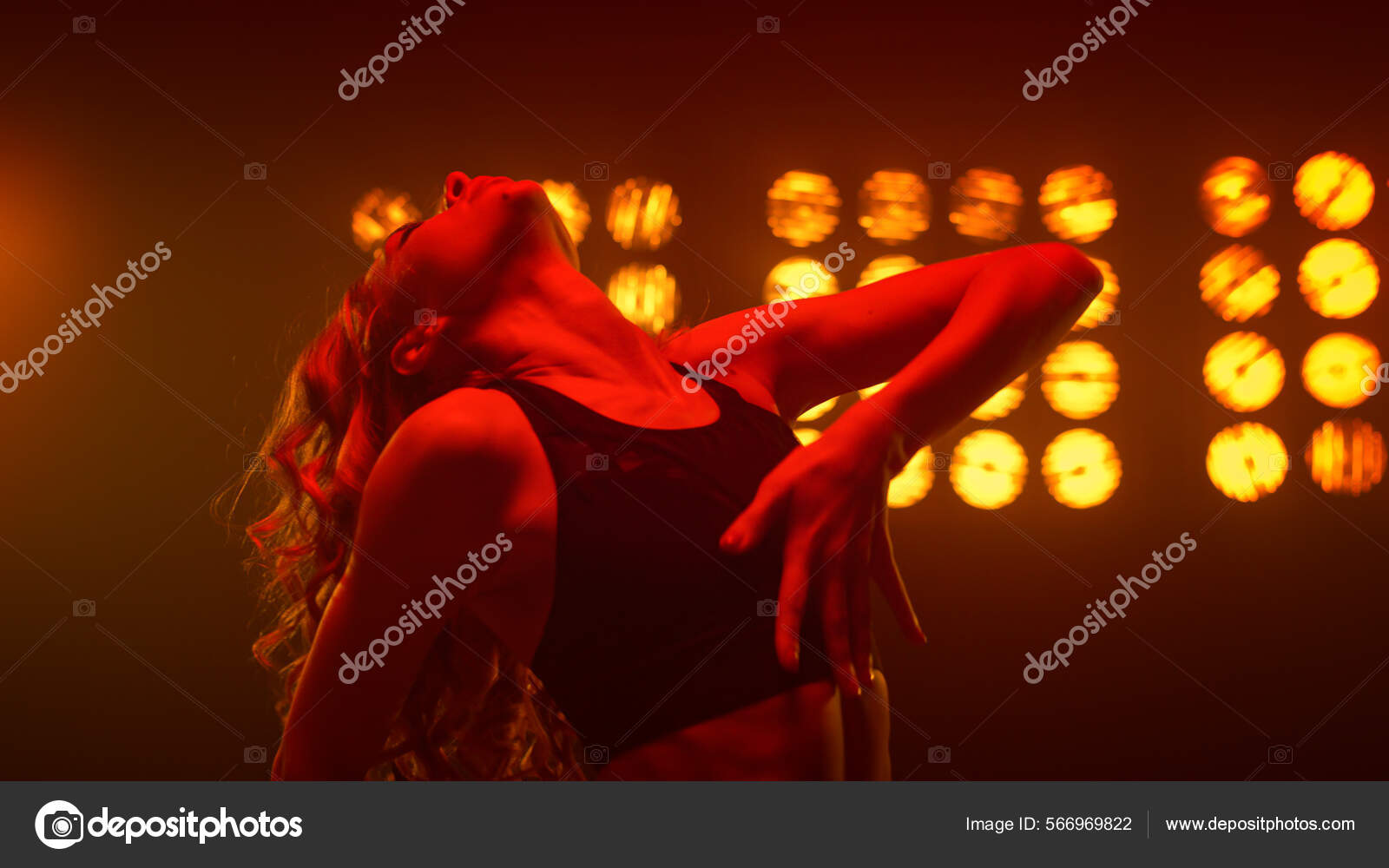 Portrait lady touching body on dancing show photo