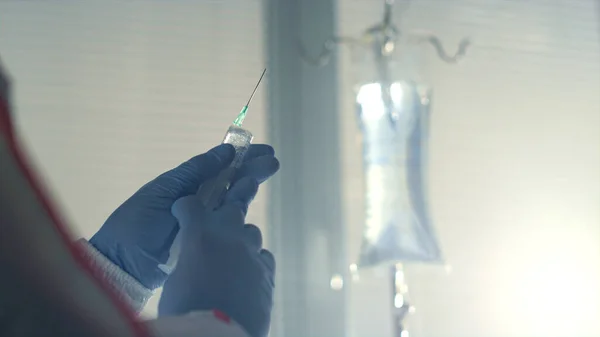 Nurse holding syringe vaccine close up. Hospital infectious disease department — ストック写真