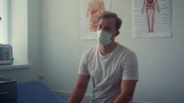 Patient listening doctor appointment in hospital close up. Medic noting data.