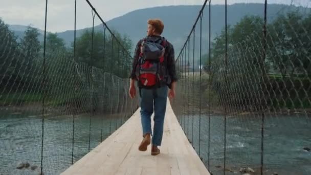 Man traveling mountain nature. Hiker walking enjoying picturesque landscape view — стоковое видео