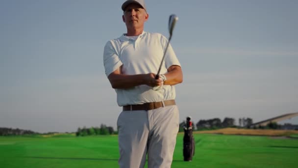 Golf Player Enjoy Hobby Green Course Old Man Watch Golfing — Stock Video