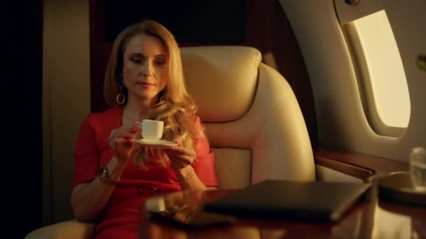 Tired Entrepreneur Resting Airplane Closeup Beautiful Blonde Drinking Coffee Golden — Stock Video