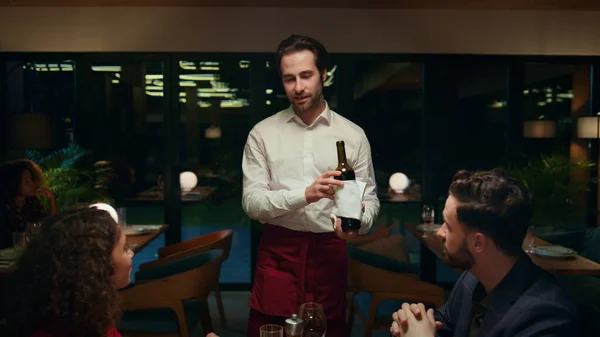 Restaurant Waiter Pouring Wine Serving Mixed Race Couple Fancy Cafe — Stock Photo, Image