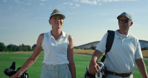 Golf Players Couple Walk Together Lush Course Rich People Talking — Fotografia de Stock