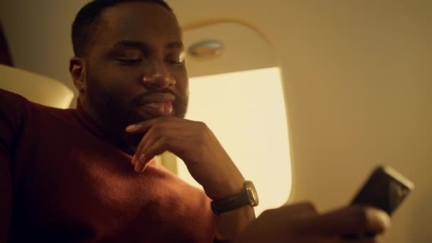 Pensive Guy Using Cellphone Closeup Delighted Passenger Browsing Phone Online — Stock Video