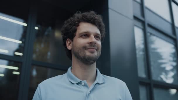 Closeup Smiling Man Teacher Standing School Entrance Looking Distance Joyful — Stockvideo