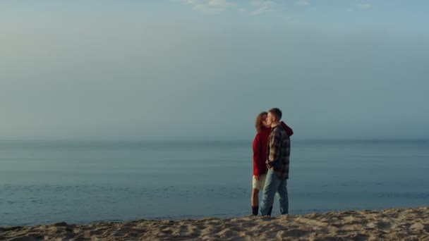 Wide Shot Affectionate Couple Standing Sea Shore Loving Woman Kissing — Stock Video