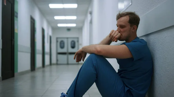 Depressed Doctor Experiencing Hard Emotions Sitting Clinic Hallway Close Upset — Fotografia de Stock