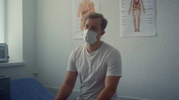 Caucasian Man Patient Listening Doctor Appointment Sitting Modern Hospital Close — Stock fotografie