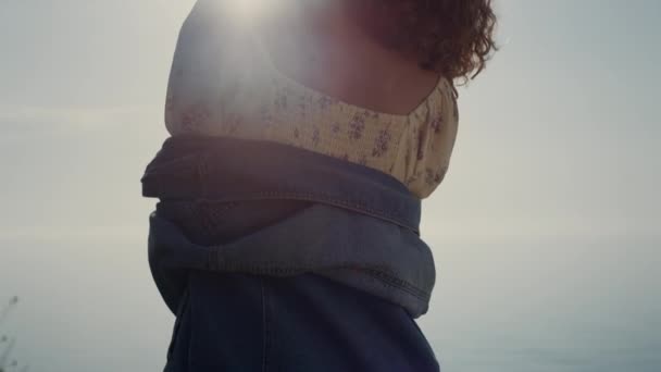 Unknown Relaxed Girl Standing Backwards Beach Enjoying Bright Evening Sunlight — Stock videók