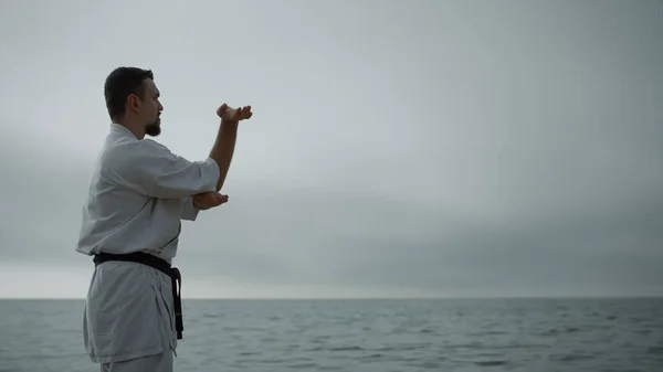 Bearded Sportsman Practicing Martial Arts Standing Beach Gloomy Morning Caucasian — 스톡 사진