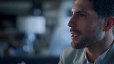 Closeup businessman resting restaurant place. Professional unshaven entrepreneur portrait spending time in expensive luxury cafe. Rich leader boss enjoying break in fancy hotel lounge slow motion