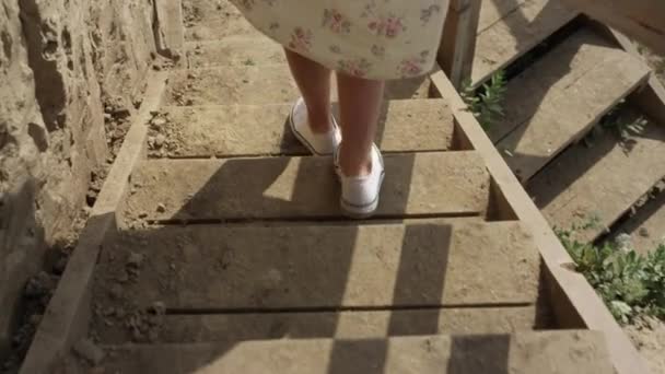 Unknown Energetic Woman Wearing Cute Dress Running Wooden Stairs Beach — Videoclip de stoc