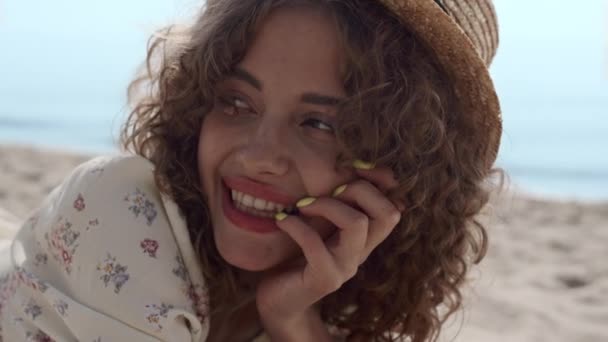 Portrait Smiling Curly Girl Lying Beach Sand Beautiful Summer Day — Vídeos de Stock