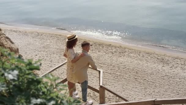 Romantic Pair Hugging Beach Staircase Enjoying Beautiful Ocean View Happy — Stock videók