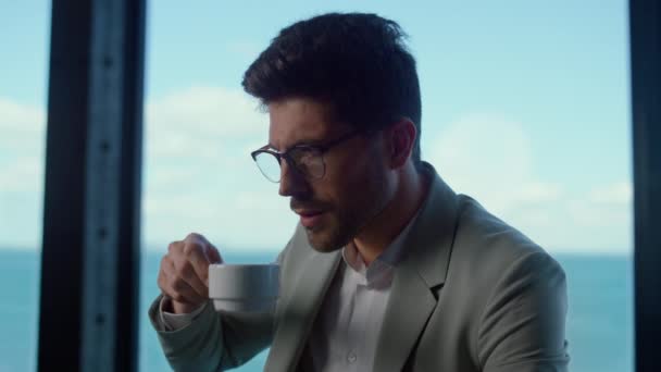 Serious Businessman Drink Coffee Ocean View Office Focused Leader Person — Vídeo de Stock