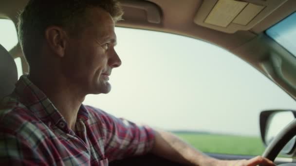 Man Driving Car Country Road Closeup Focused Driver Cabin Green — Stock video