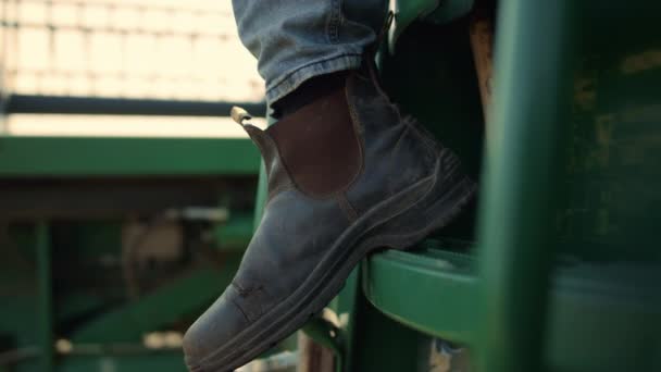 Closeup Driver Leg Tractor Countryside Farmer Dusty Boot Harvester Ladder — стоковое видео