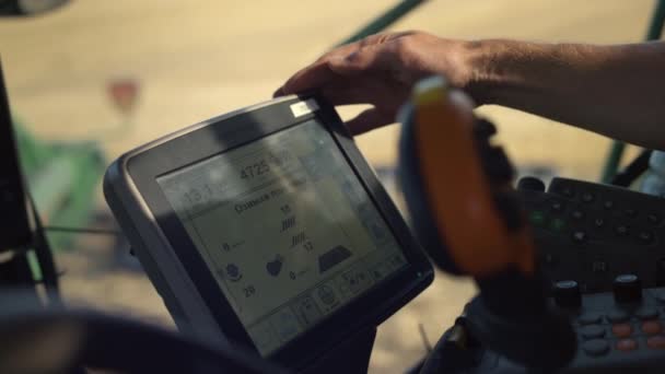 Hand Touching Harvester Monitor Closeup Tractor Driver Working Grain Field — Video