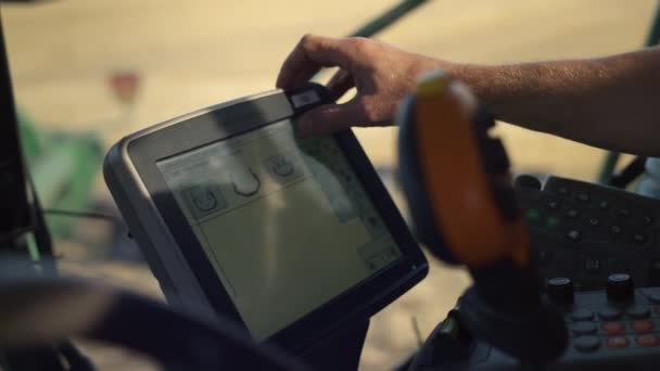 Hand Touching Vehicle Display Farmland Closeup Driver Controlling Harvester Smart — Stockvideo