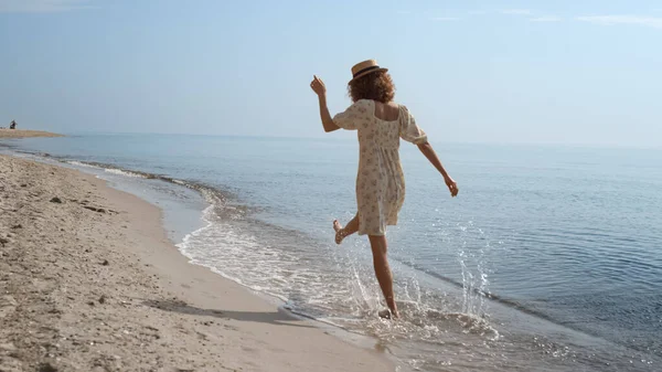 Cheerful Young Girl Running Ocean Waves Happily Beautiful Sunny Day — Zdjęcie stockowe