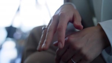 Unknown woman unsure gesturing hand at business conversation. Closeup hesitancy business professional arms speaking. Critical businesswoman showing skeptic emotion. Disbelief expression concept 