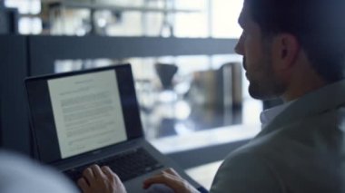 Closeup businessman talking worker using laptop. Agent meeting client discussing contract details. Man ceo analyzing business planning with unknown colleague. Corporate communication concept 