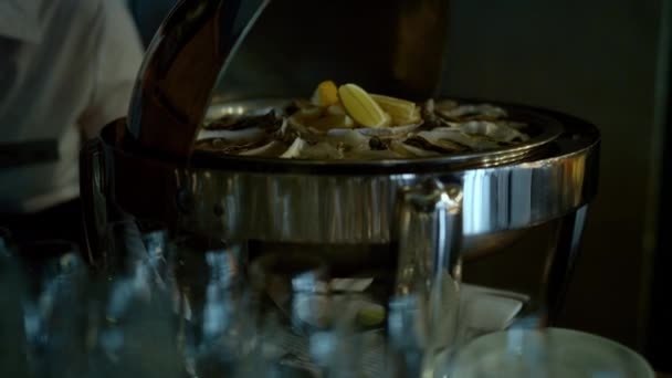 Delicious Raw Oysters Lemon Serving Iced Dish Plate Closeup Unknown — Stockvideo