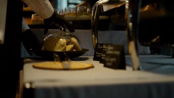 Closeup Hands Setting Glass Bell Dome Breakfast Bakery Buffet Unknown — Stockvideo