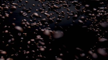 Explosion brown coffee grains close up. Super slow motion of splashing fragrant beans on black background. Aromatic fresh coffee seeds flying on camera. Morning tasty energetic beverage concept.