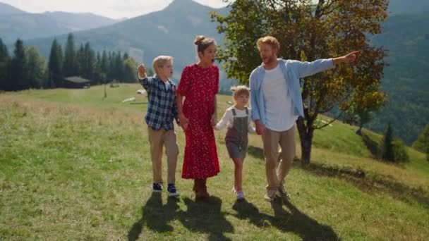 Smiling Family Enjoying Nature Walking Sunny Mountain Hill Red Hair — Stockvideo