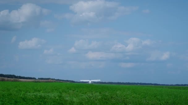 Lightweight Plane Flying Countryside Aerodrome Gaining Altitude Blue Cloudy Sky — Video