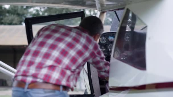 Professional Pilot Taking Seat Cabin White Private Airplane Aerodrome Man — Video