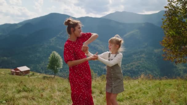 Cheerful Mother Dancing Daughter Green Meadow Happy Woman Holding Hands — Video