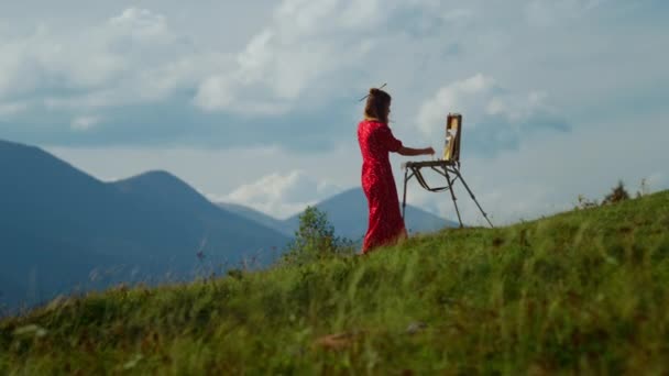 Back View Creative Girl Painting Cloudy Mountains Scenery Outdoors Unrecognizable — Stok video