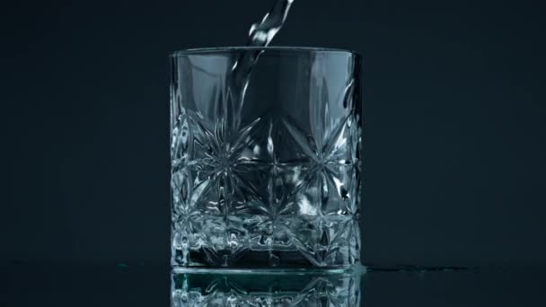 Pouring Water Crystal Glass Dark Background Closeup Liquid Stream Falling — Wideo stockowe