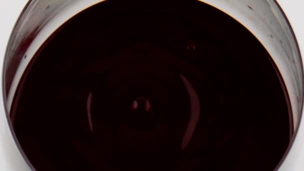 Red Wine Droplet Falling Glass Closeup Smooth Liquid Surface Ripple — Stockvideo