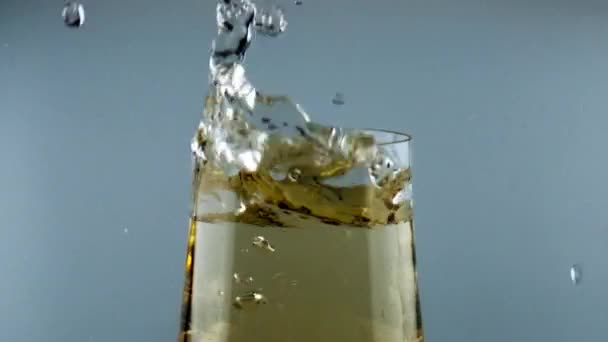 Ice Cube Falling Wine Goblet Closeup Cool Alcohol Beverage Splashing — Vídeos de Stock