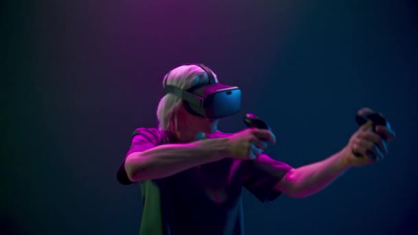 Emotional Man Playing Shooter Using Joysticks Closeup Glasses Guy Hands — Video