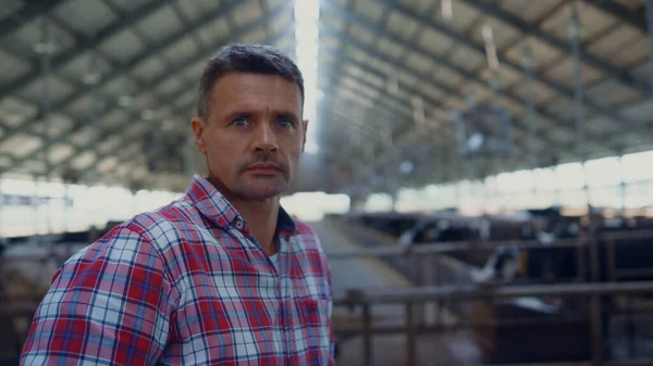 Rancher Standing Modern Cowshed Looking Camera Close Portrait Serious Farm — Stockfoto