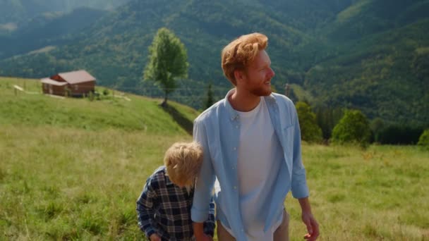 Happy Father Leading Cute Son Hand Walking Mountain Hill Sunny — Stok video