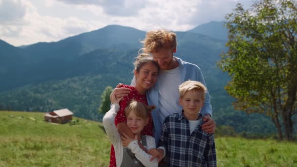 Portrait Happy Family Posing Camera Front Mountains Summer Holiday Smiling — Vídeo de Stock