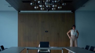 Focused manager solving problem alone. Frustrated businesswoman walking room looking inspiration making difficult decision in meeting room. Stressed ceo lawyer feel stuck desperate. Job career concept